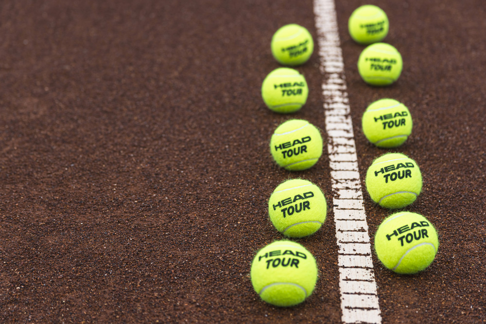 pexels-pixabay-207361 Tennisbälle an der Linie